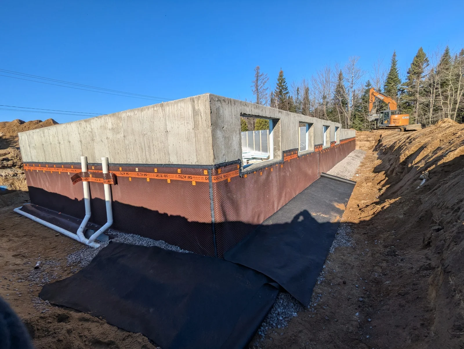 Travaux de drain français réalisés par Excavation Mathieu GG